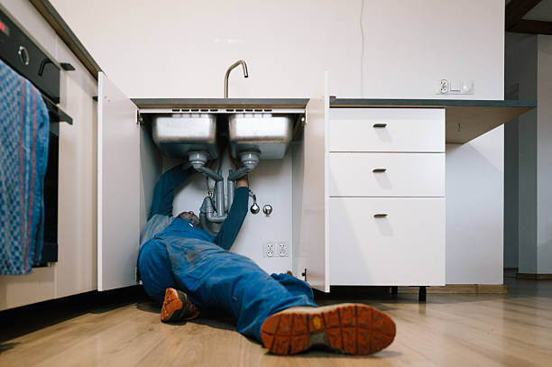 Professional Drain Cleaning technician working in Pleasantville, IA